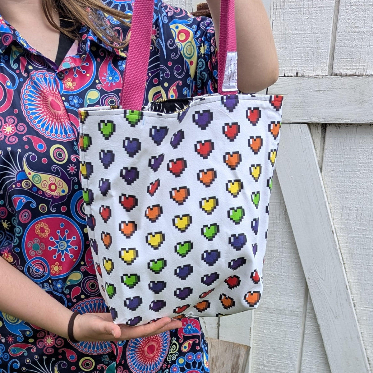 Pride Reversible Tote Bags Pixel Hearts and Edward Gorey Flowers